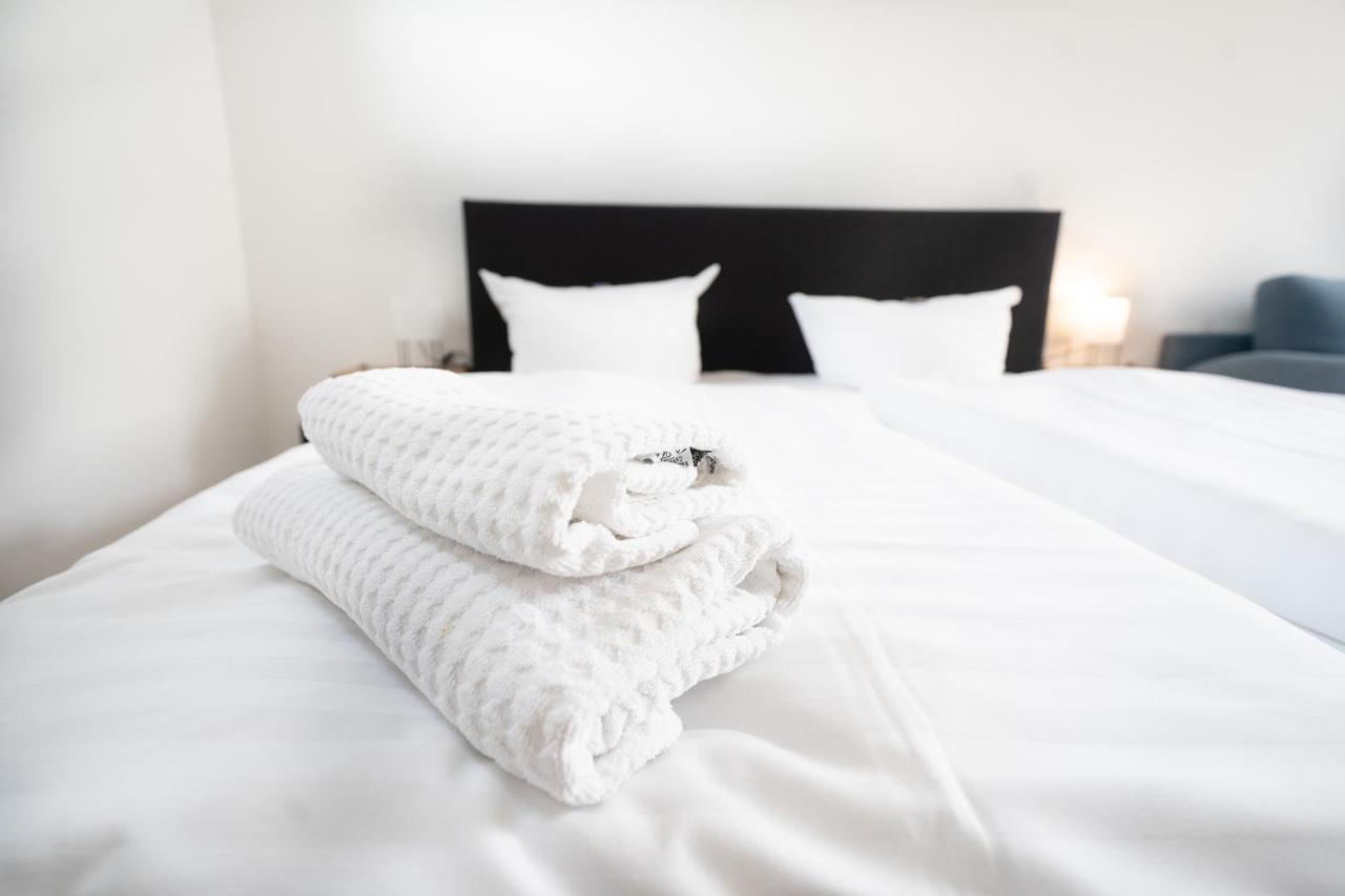 Hotel Zur Alten Stadtkellerei Leipzig Luaran gambar A bed with a duvet